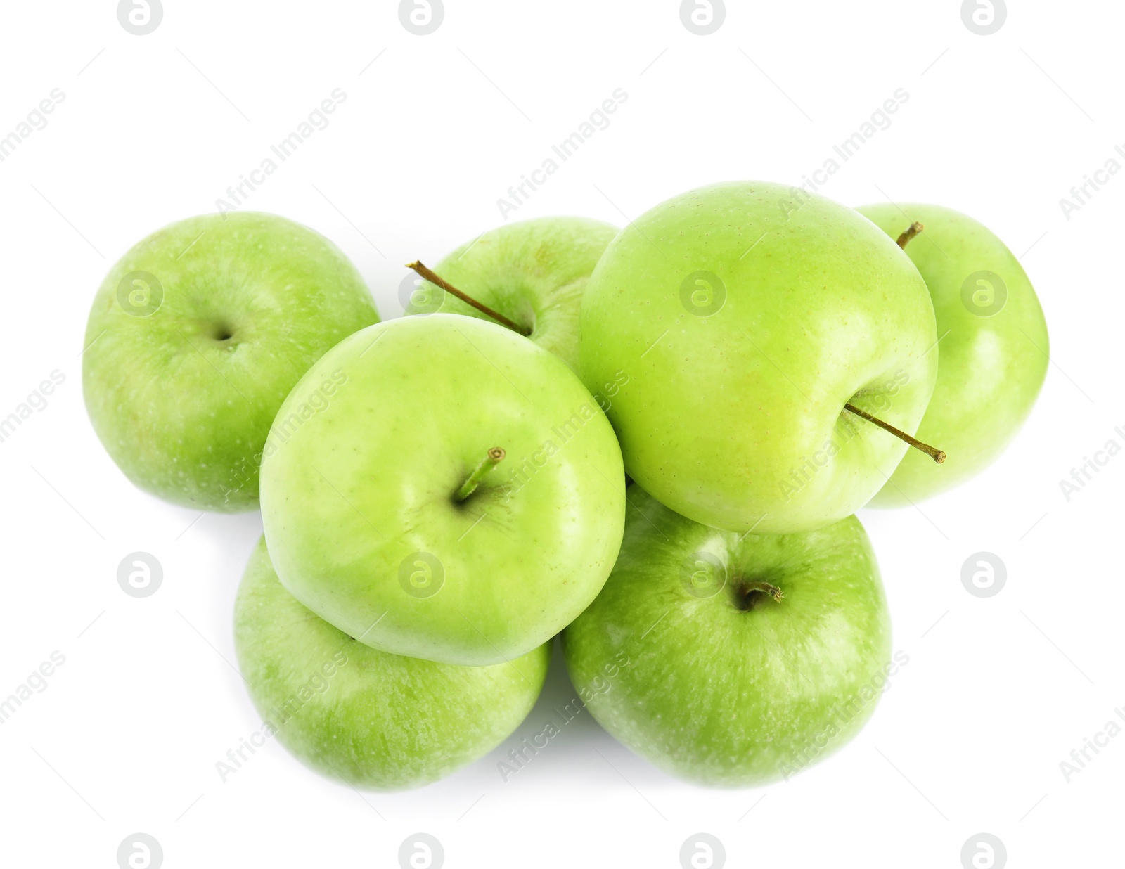 Photo of Pile of fresh ripe green apples on white background, top view