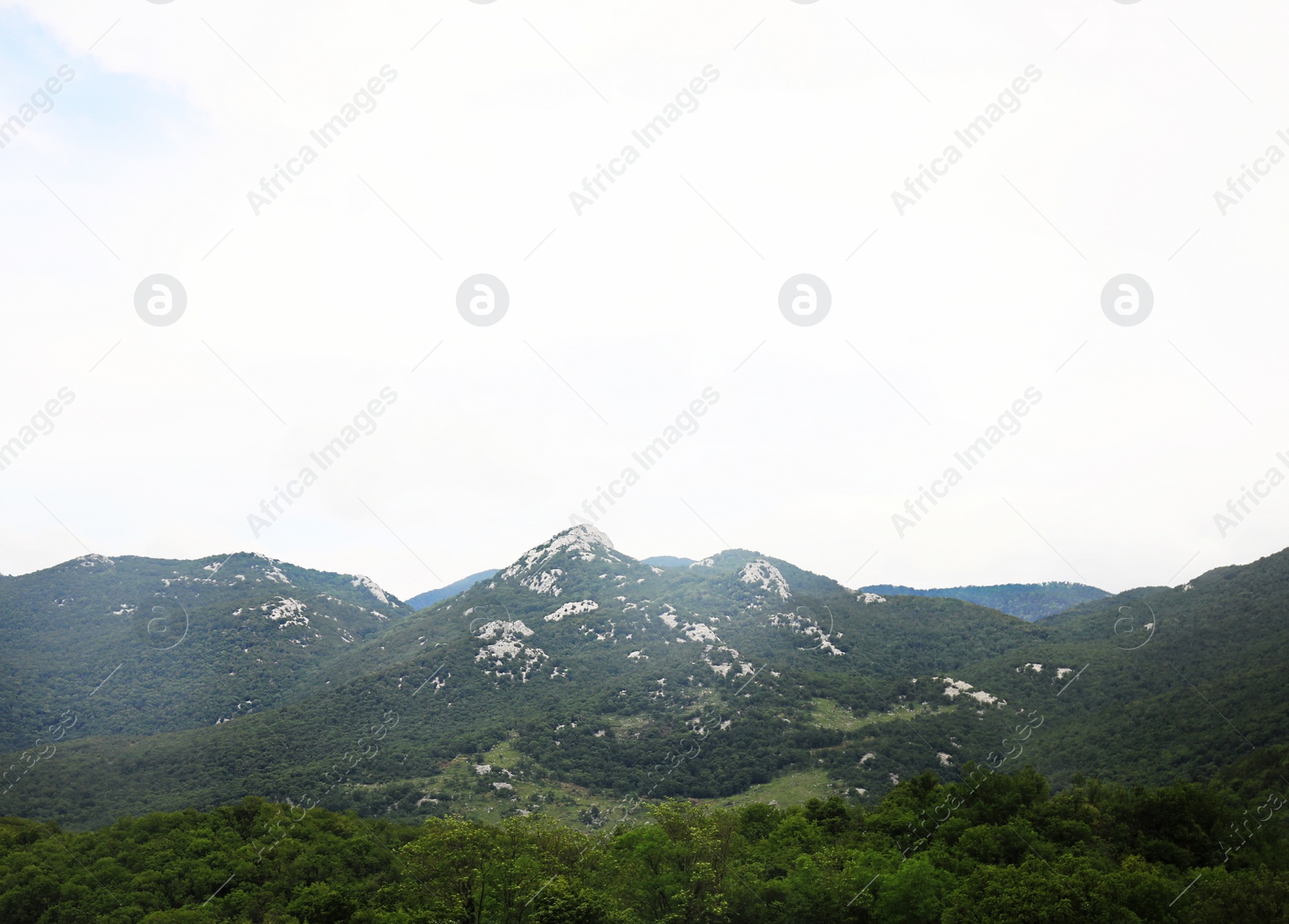 Photo of Picturesque view of beautiful mountains on cloudy day