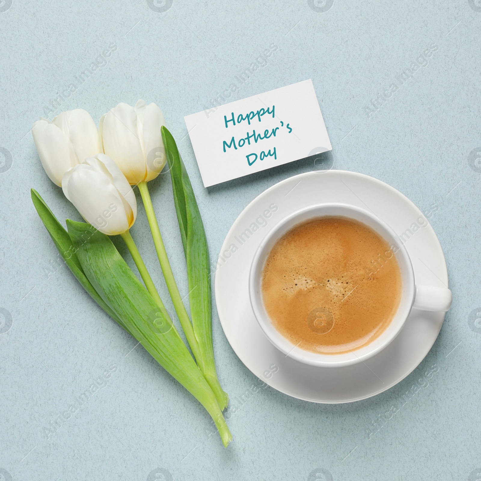 Image of Card with phrase HAPPY MOTHER'S DAY, tulips and cup of coffee on light background, flat lay