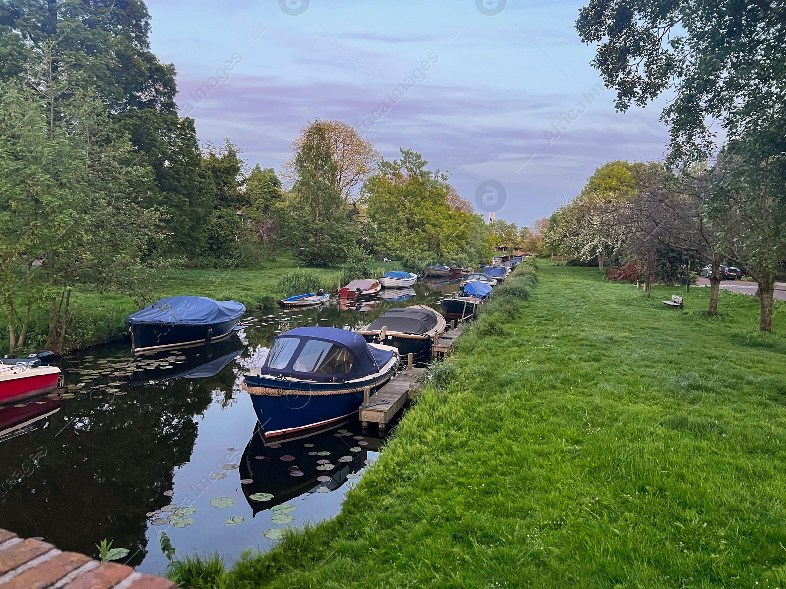 Photo of Beautiful view of canal with moored boats outdoors