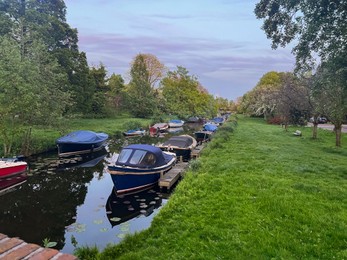 Photo of Beautiful view of canal with moored boats outdoors