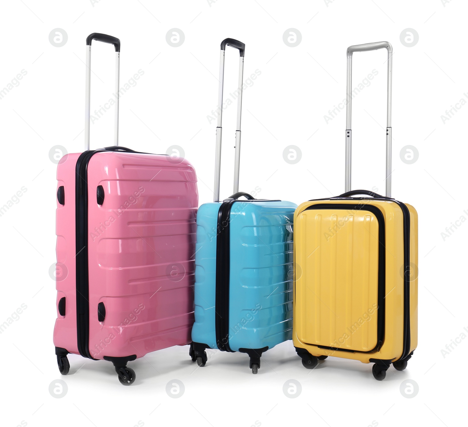 Photo of Stylish suitcases packed for travel on white background. Summer vacation