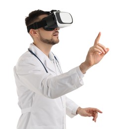Photo of Doctor using virtual reality headset on white background