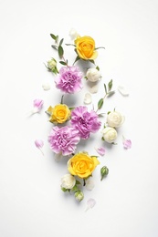 Flat lay composition with beautiful blooming flowers on white background