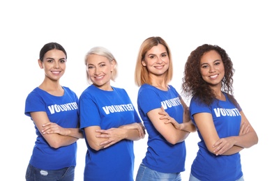 Photo of Team of female volunteers in uniform on white background