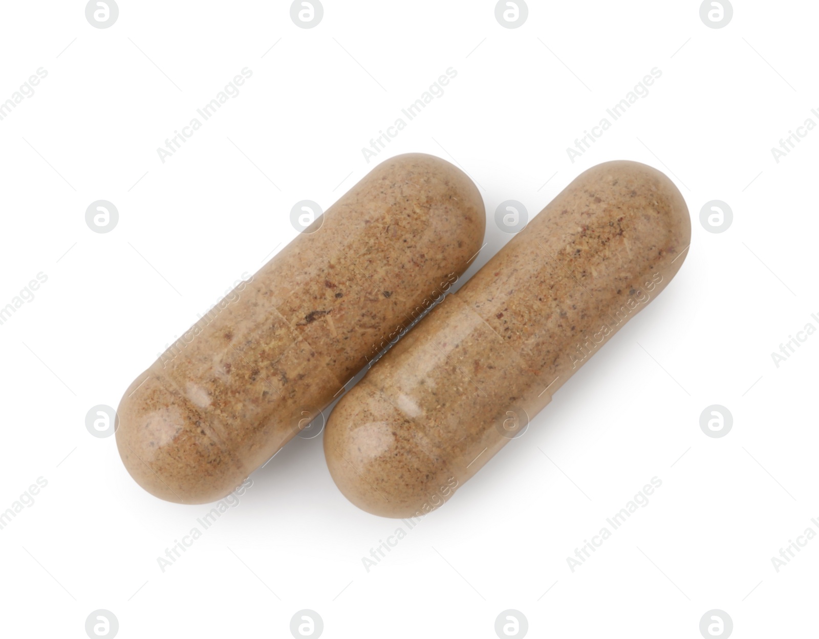 Photo of Two vitamin capsules isolated on white, top view