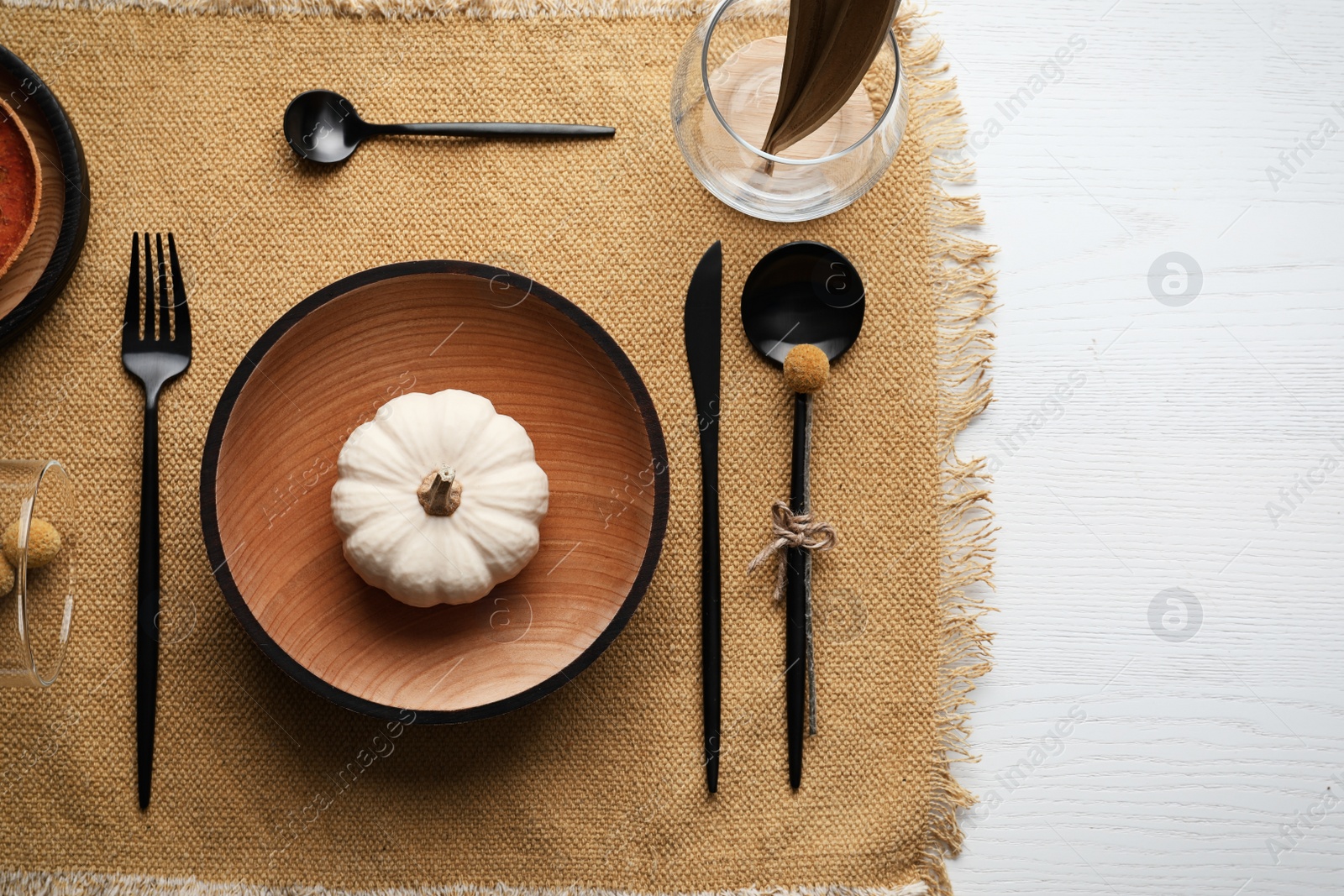 Photo of Autumn table setting with pumpkin on white wooden background, flat lay