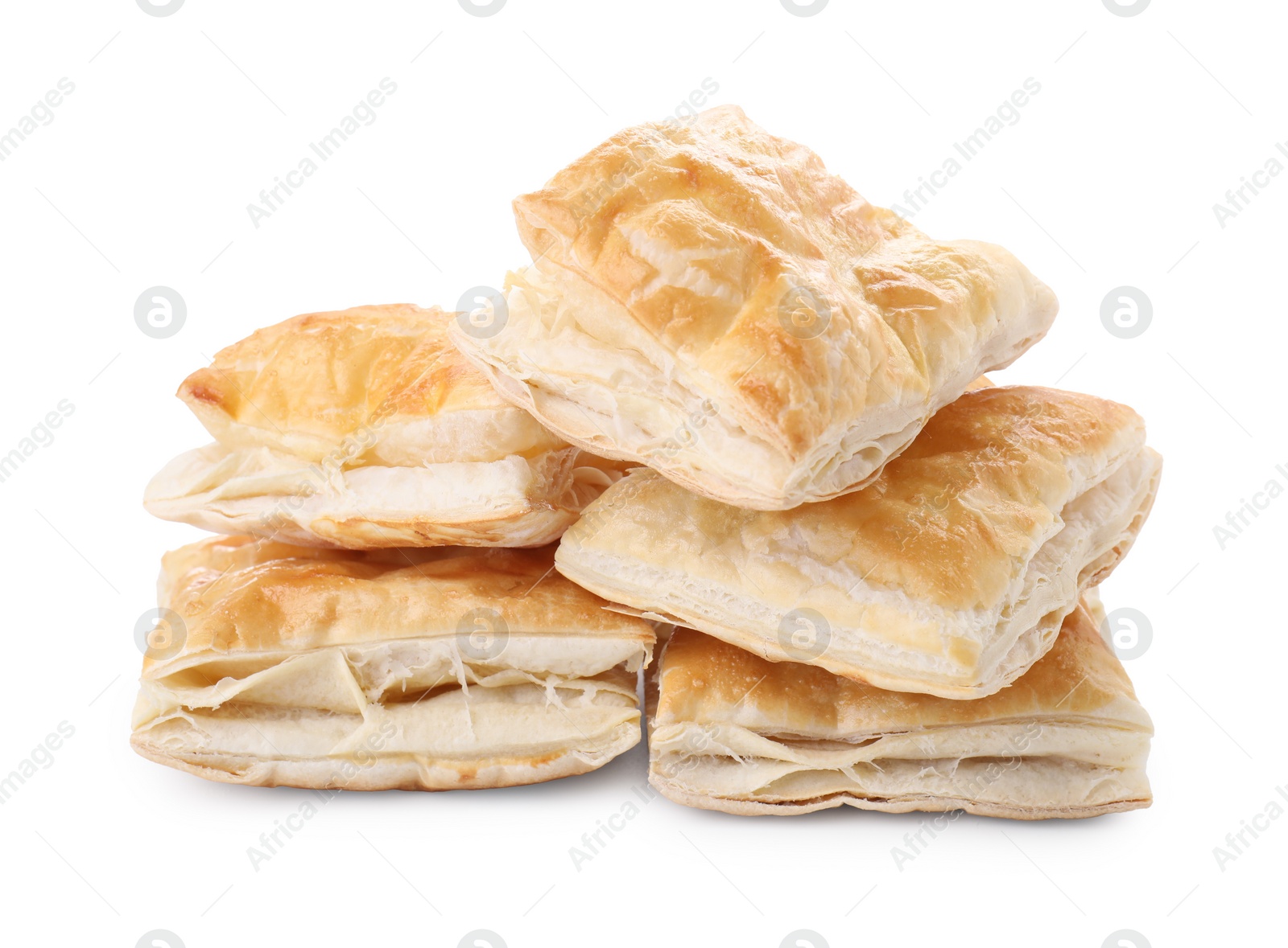 Photo of Delicious fresh puff pastries isolated on white