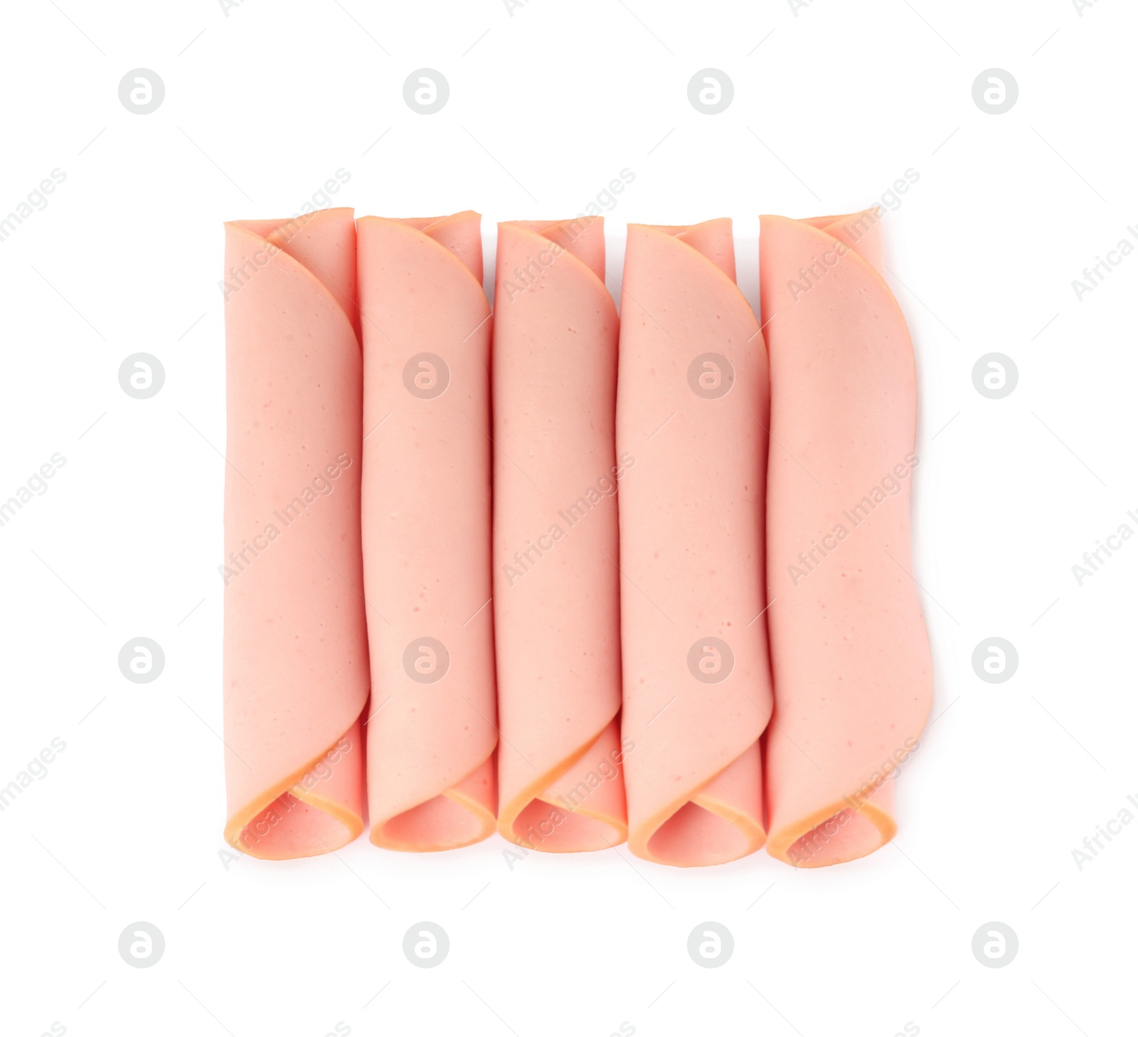 Photo of Slices of delicious boiled sausage on white background, top view