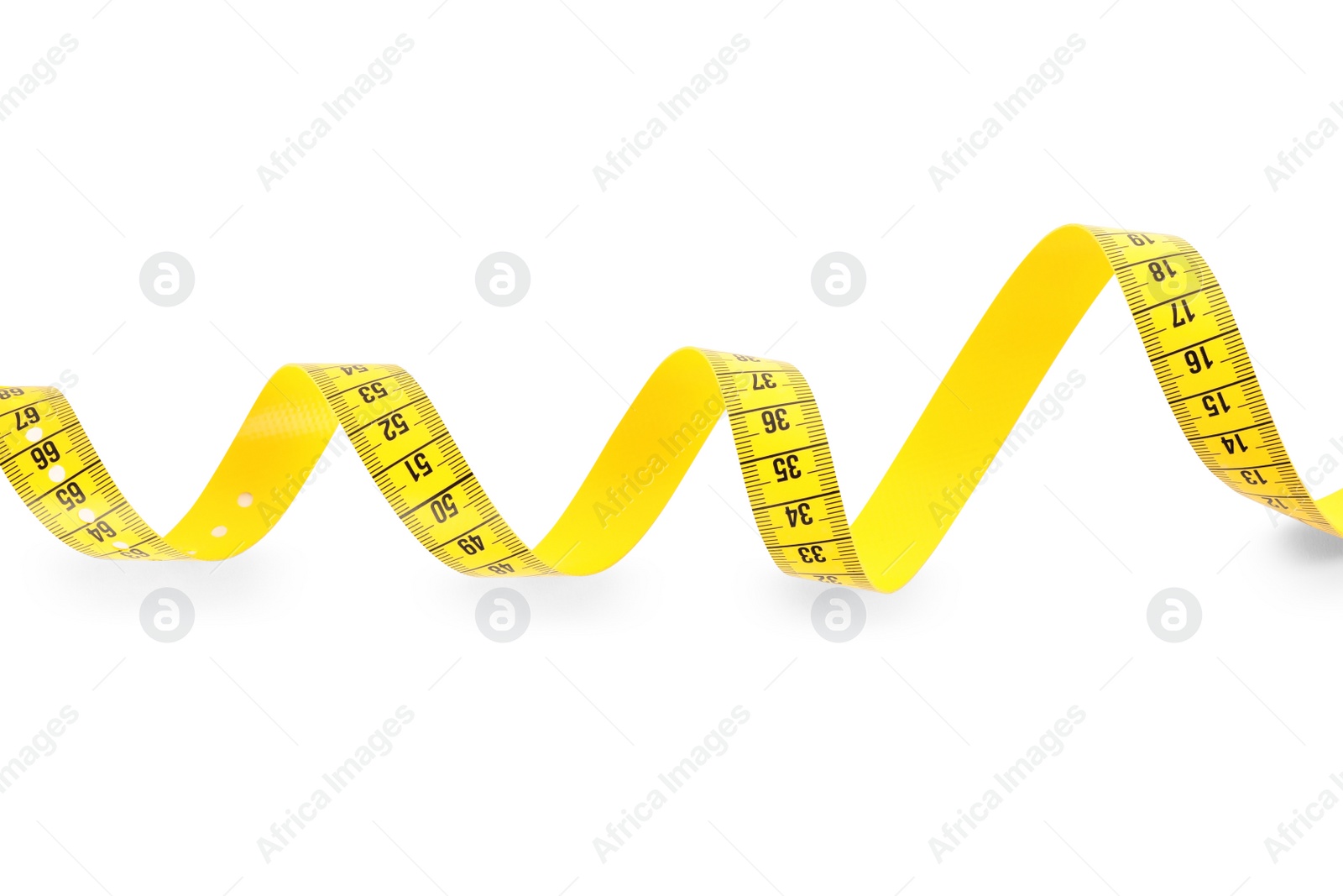 Photo of New yellow measuring tape isolated on white