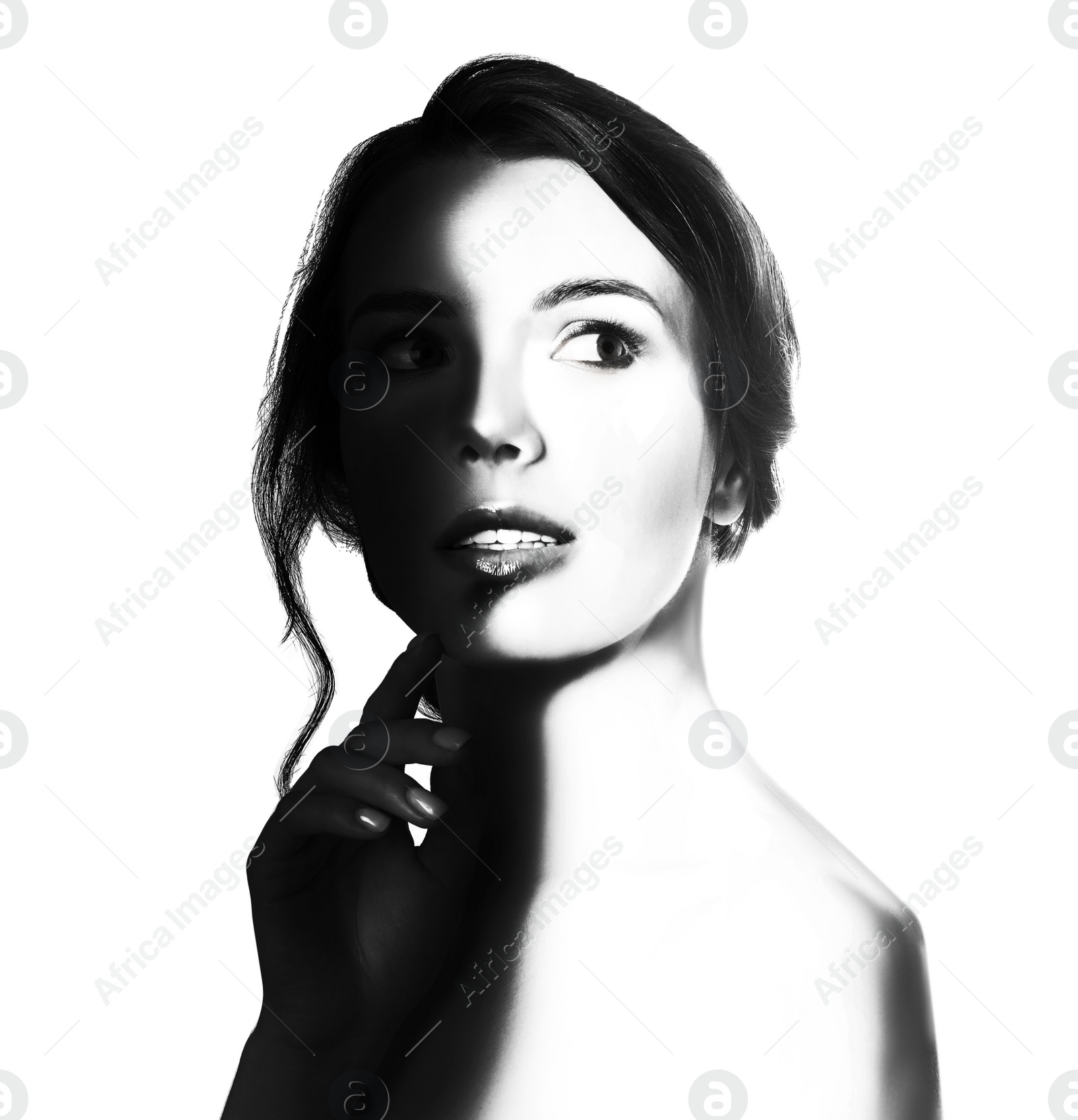 Image of High contrast black and white portrait of beautiful young woman