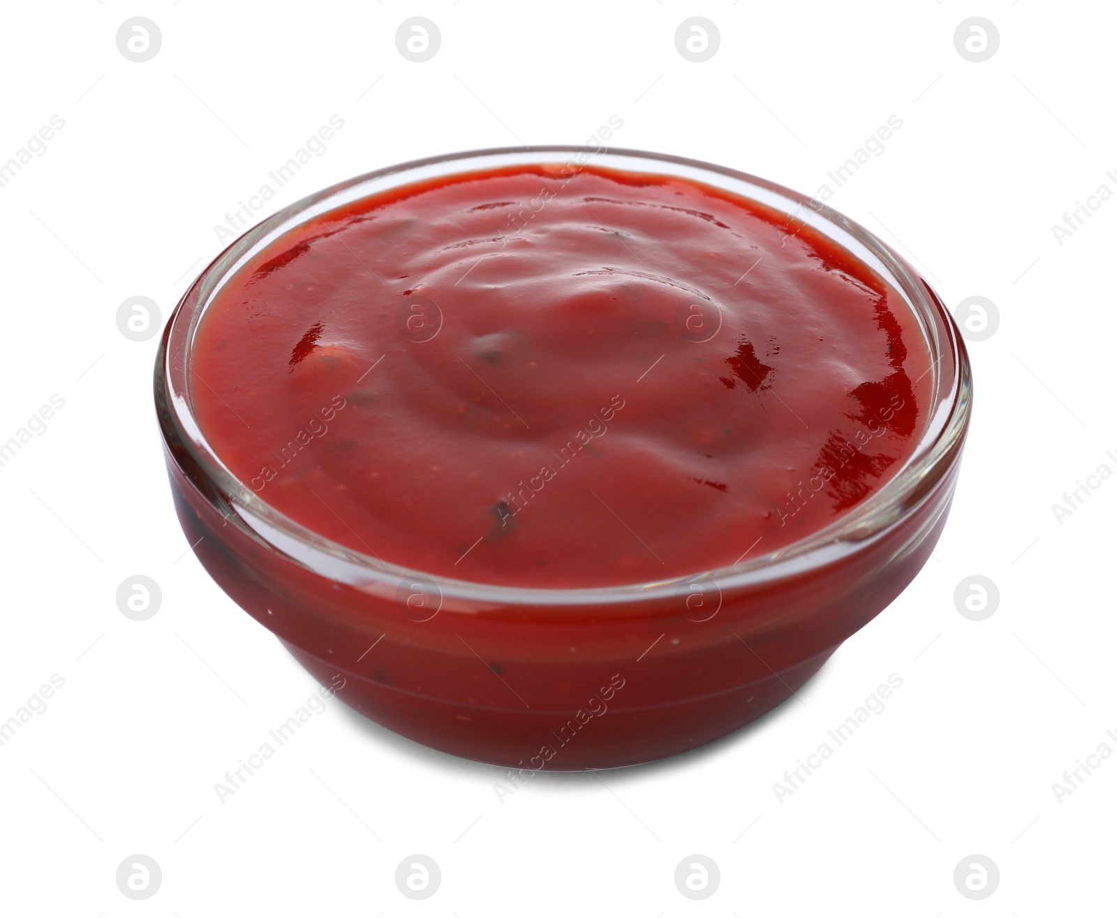 Photo of Bowl of spicy chili sauce on white background