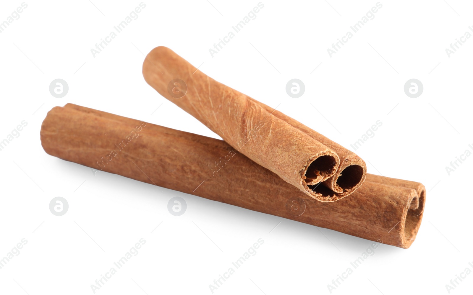 Photo of Two aromatic cinnamon sticks isolated on white