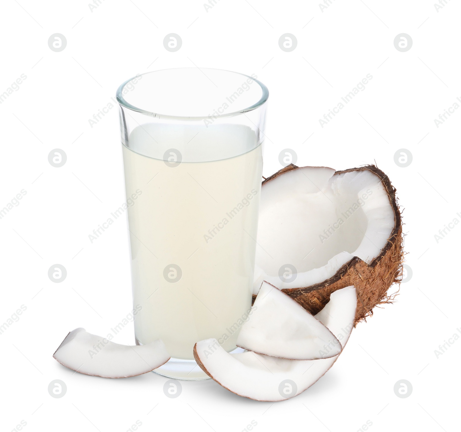 Photo of Glass of coconut water and nuts isolated on white