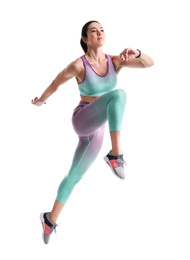 Photo of Athletic young woman running on white background