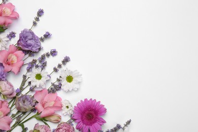 Photo of Flat lay composition with different beautiful flowers on white background, space for text