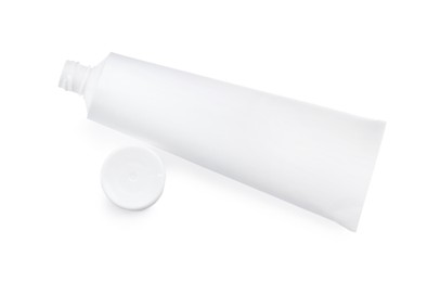 Photo of Blank tube of toothpaste isolated on white, above view