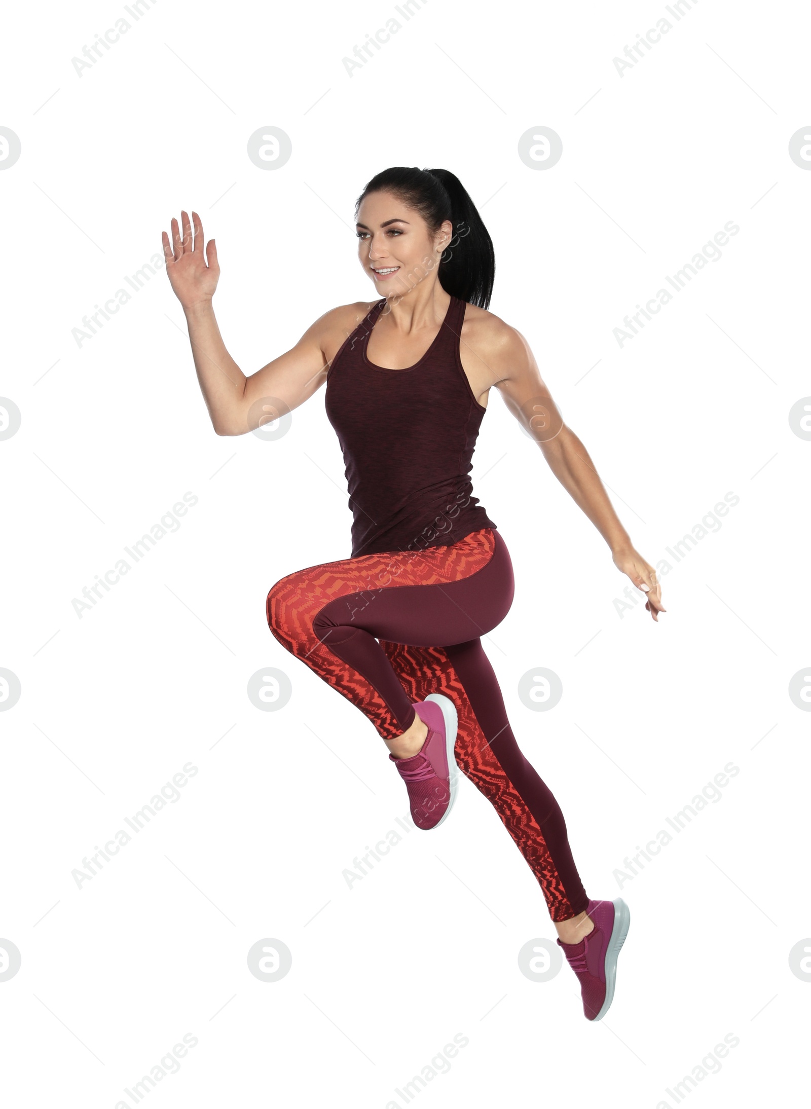 Photo of Sporty young woman running on white background