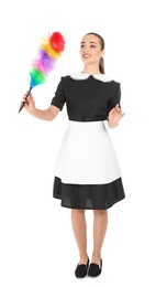 Young chambermaid with dusting brush on white background