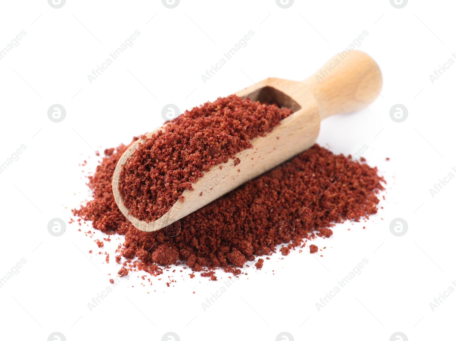 Photo of Wooden scoop with dried cranberry powder isolated on white