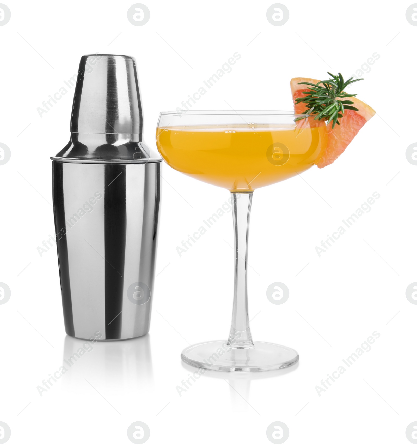 Photo of Metal shaker and delicious cocktail isolated on white