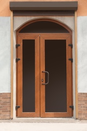 Photo of Building entrance with brown modern external door