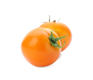 Photo of Delicious ripe orange tomatoes on white background