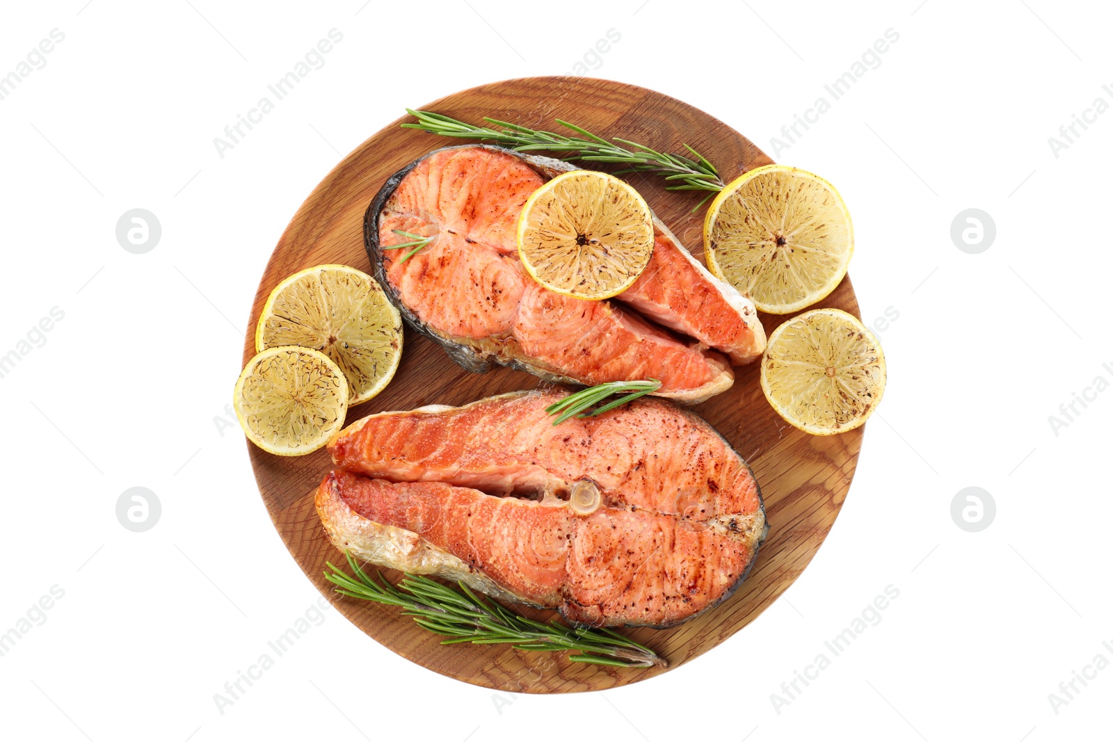 Photo of Wooden plate with tasty cooked red fish isolated on white, top view