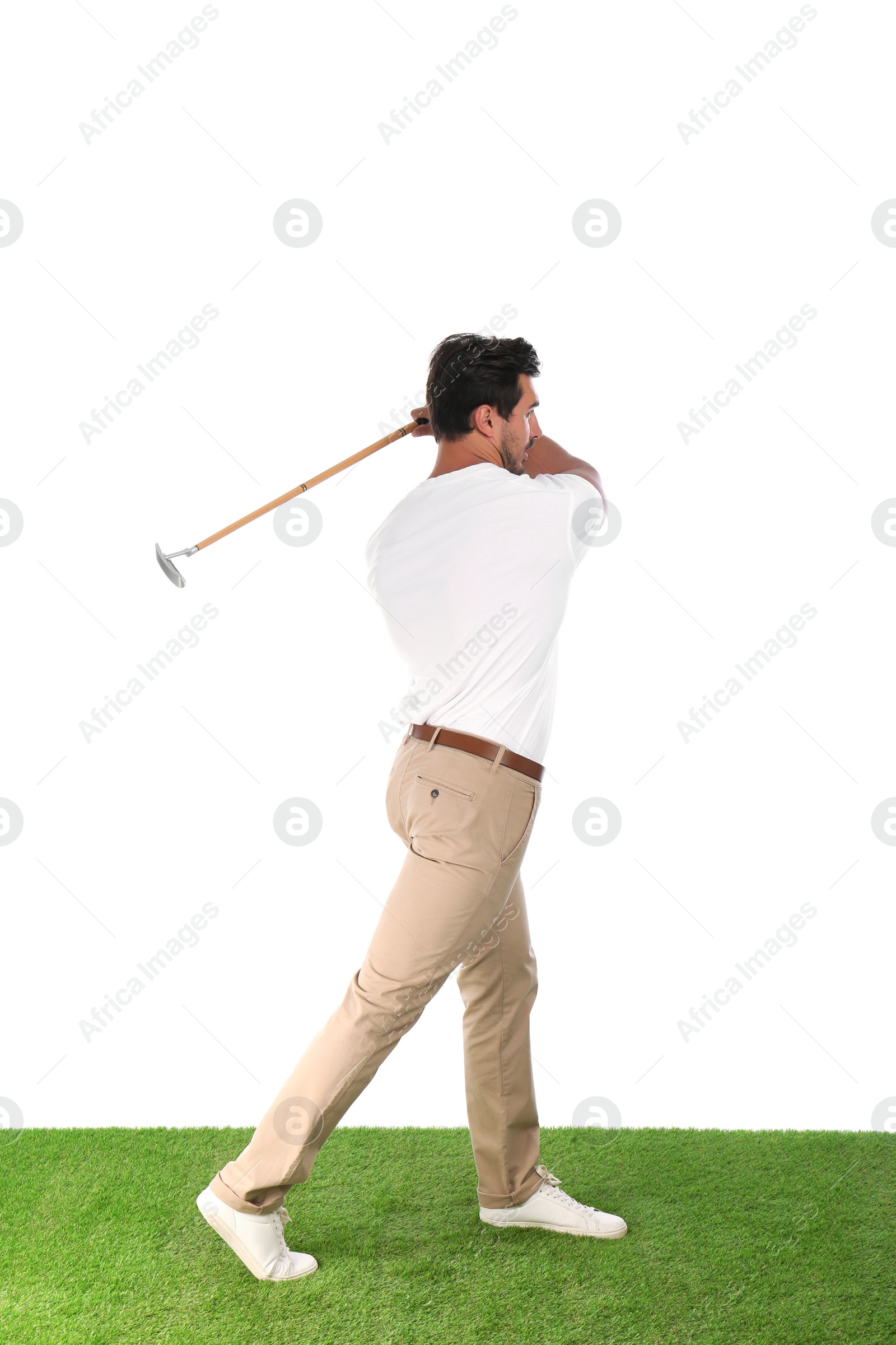 Photo of Young man playing golf on white background