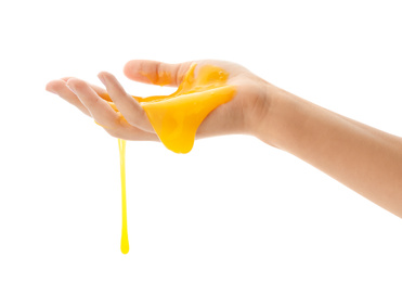 Woman playing with yellow slime isolated on white, closeup. Antistress toy