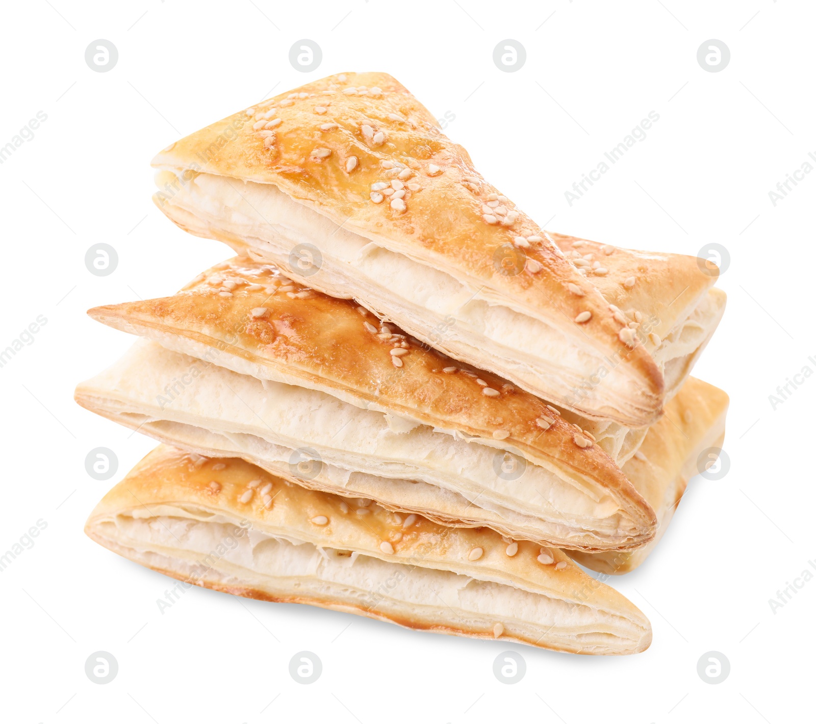 Photo of Stack of delicious fresh puff pastries isolated on white