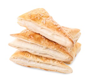 Photo of Stack of delicious fresh puff pastries isolated on white