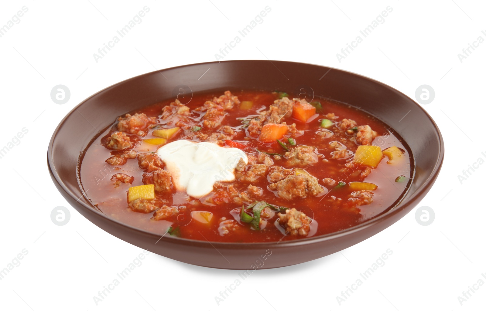 Photo of Bowl of delicious stuffed pepper soup on white background