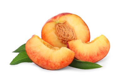 Photo of Sweet juicy cut peaches with leaves on white background