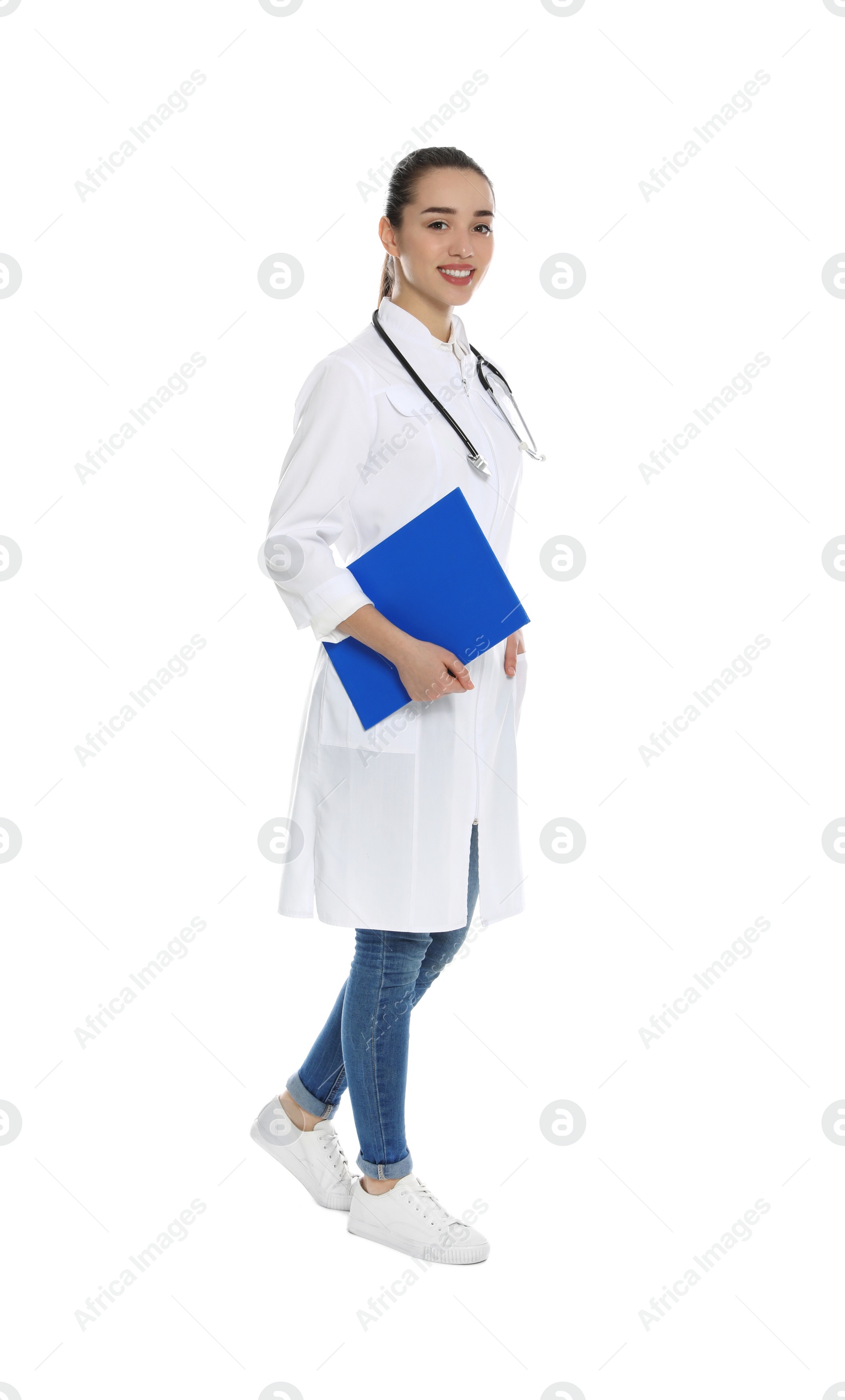 Photo of Full length portrait of medical doctor with clipboard and stethoscope isolated on white