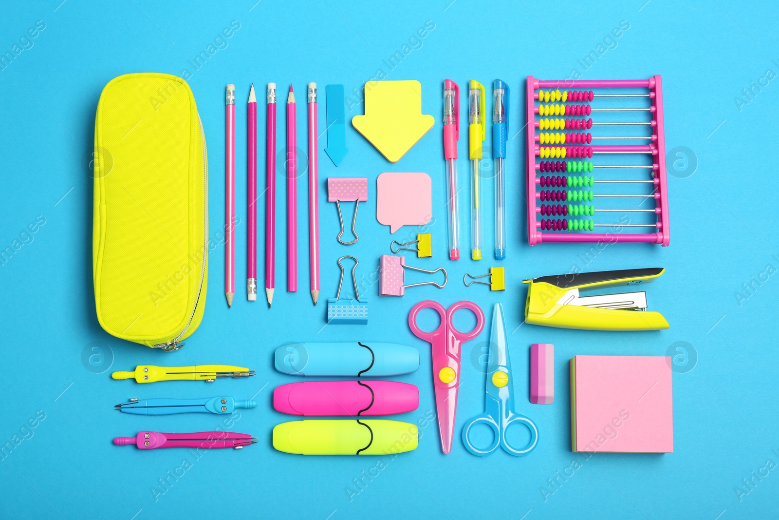 Photo of Flat lay composition with different school stationery on color background