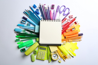 Blank notebook and school stationery on white background, flat lay with space for text. Back to school