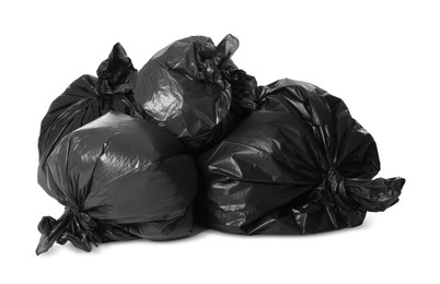 Photo of Trash bags full of garbage isolated on white