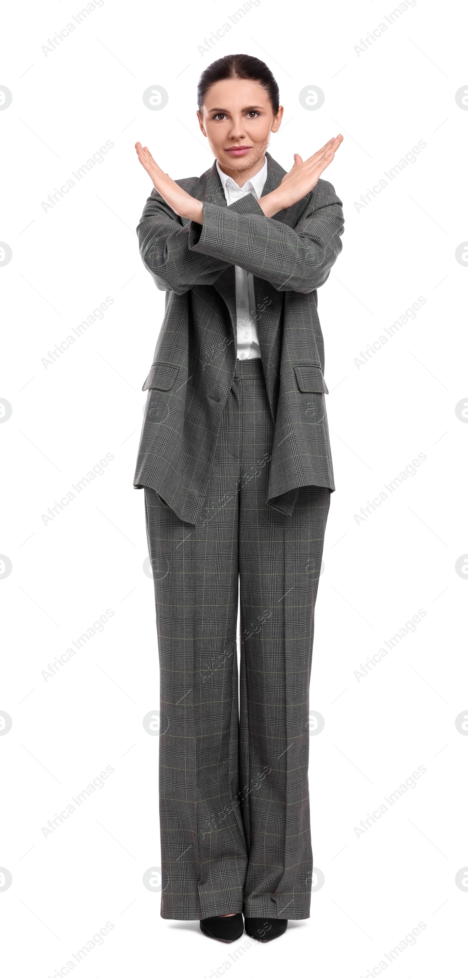 Photo of Beautiful young businesswoman in suit on white background