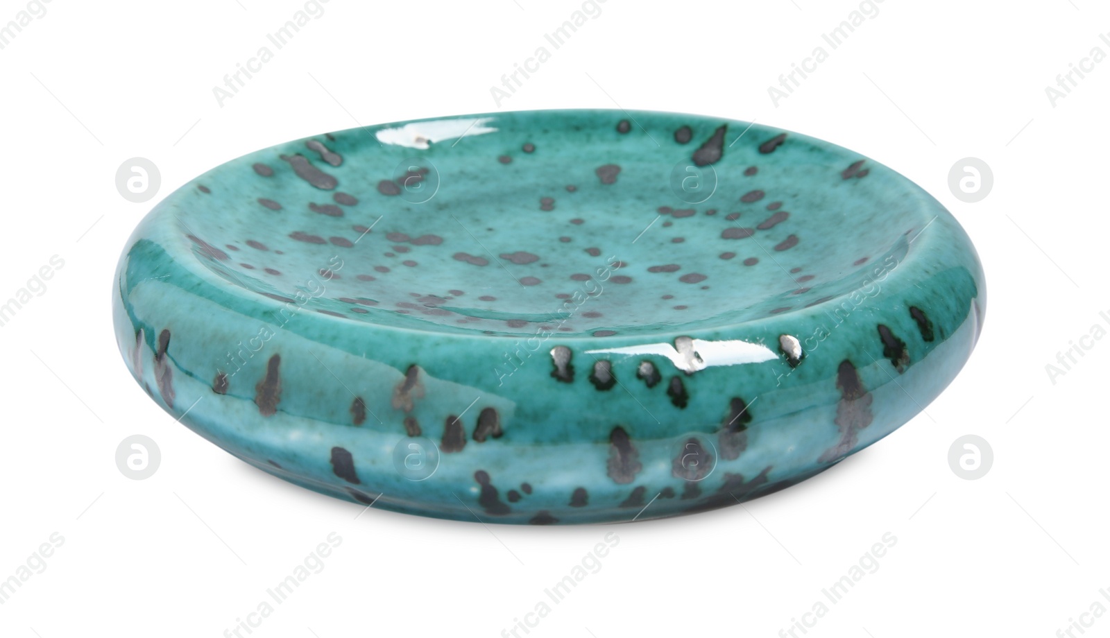 Photo of Beautiful turquoise ceramic plate isolated on white