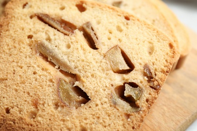 Photo of Slice of tasty pear bread on table, closeup. Homemade cake