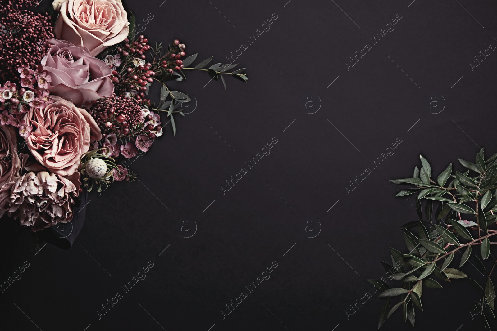 Photo of Beautiful fresh flowers on black background, space for text. Floral card design with dark vintage effect