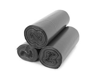 Photo of Rolls of black garbage bags isolated on white