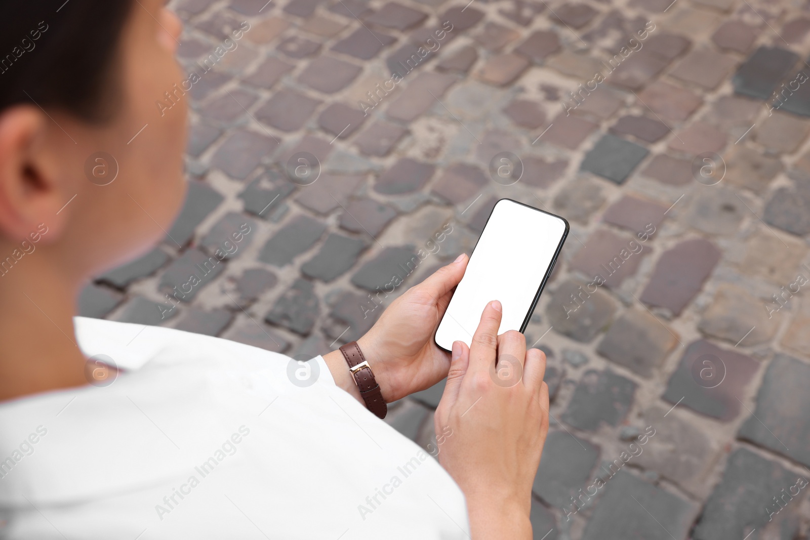 Photo of Closeup view of woman with smartphone outdoors
