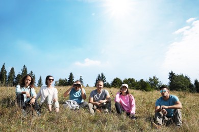 Photo of Group of people spending time together in mountains