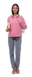 Teenage student with backpack, headphones and books on white background