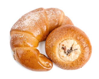 Different delicious fresh pastries on white background, top view