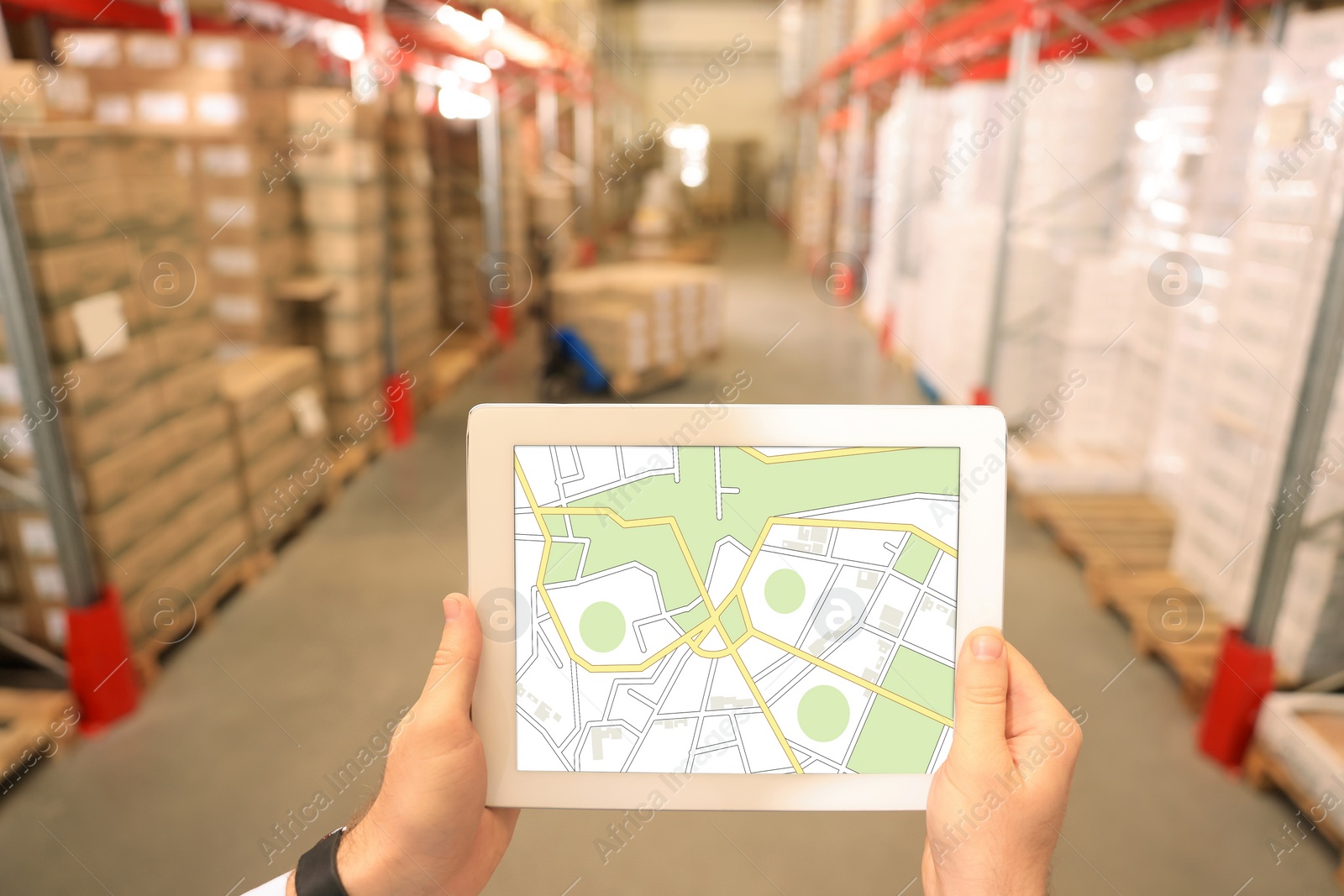 Image of Manager with tablet working at warehouse, closeup. Logistics center