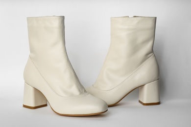 Photo of Pair of stylish leather shoes on white background