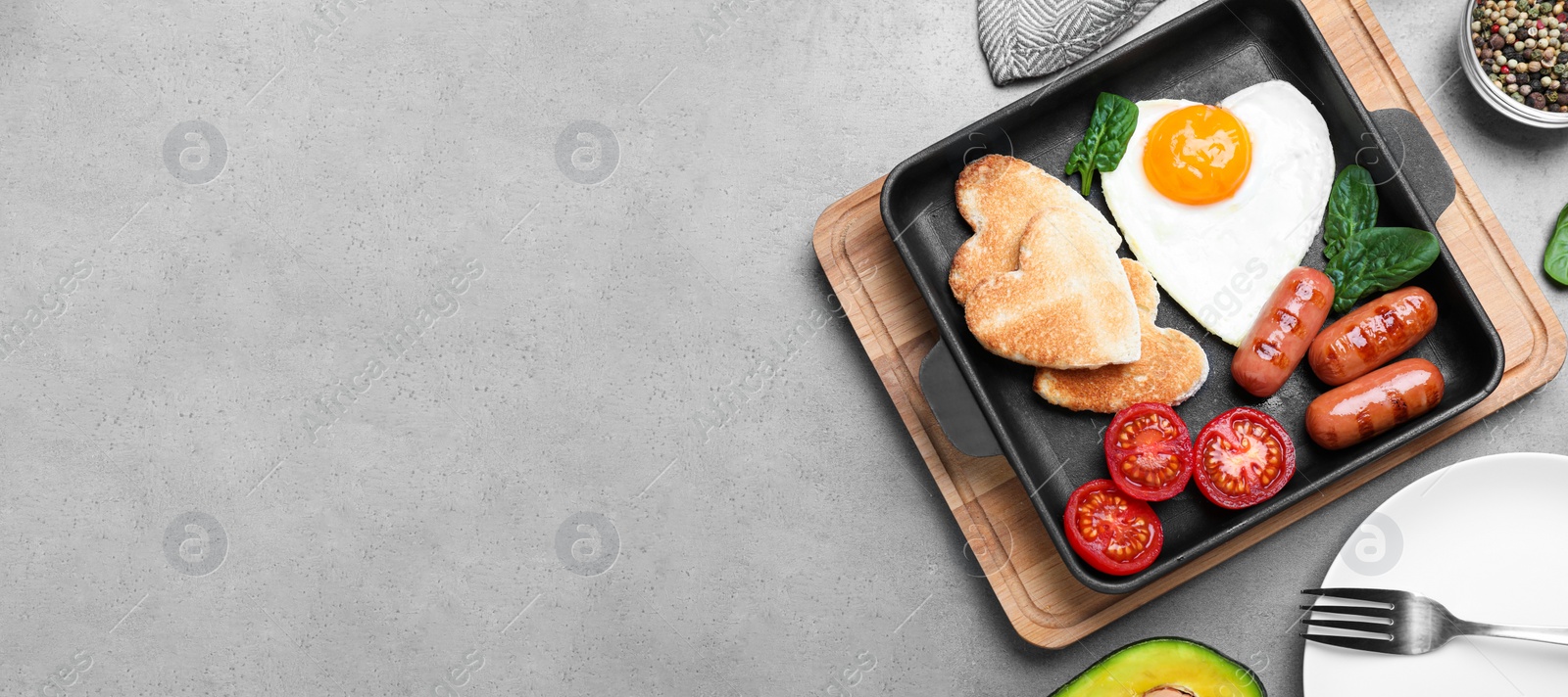 Photo of Romantic breakfast on grey table, flat lay with space for text. Valentine's day celebration